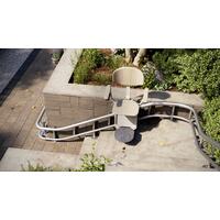 Stoličkový výťah Unizdrav so zatočenou koľajnicou