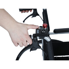 Elektrický prídavný pohon k invalidnému vozíku určený pre doprovod