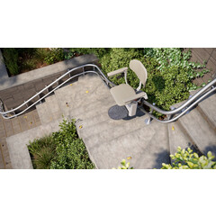 Stoličkový výťah Unizdrav so zatočenou koľajnicou