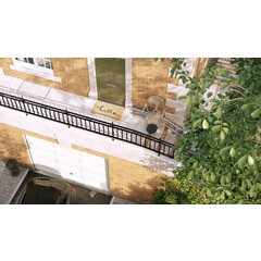 Stoličkový výťah Unizdrav so zatočenou koľajnicou