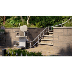 Stoličkový výťah Unizdrav so zatočenou koľajnicou