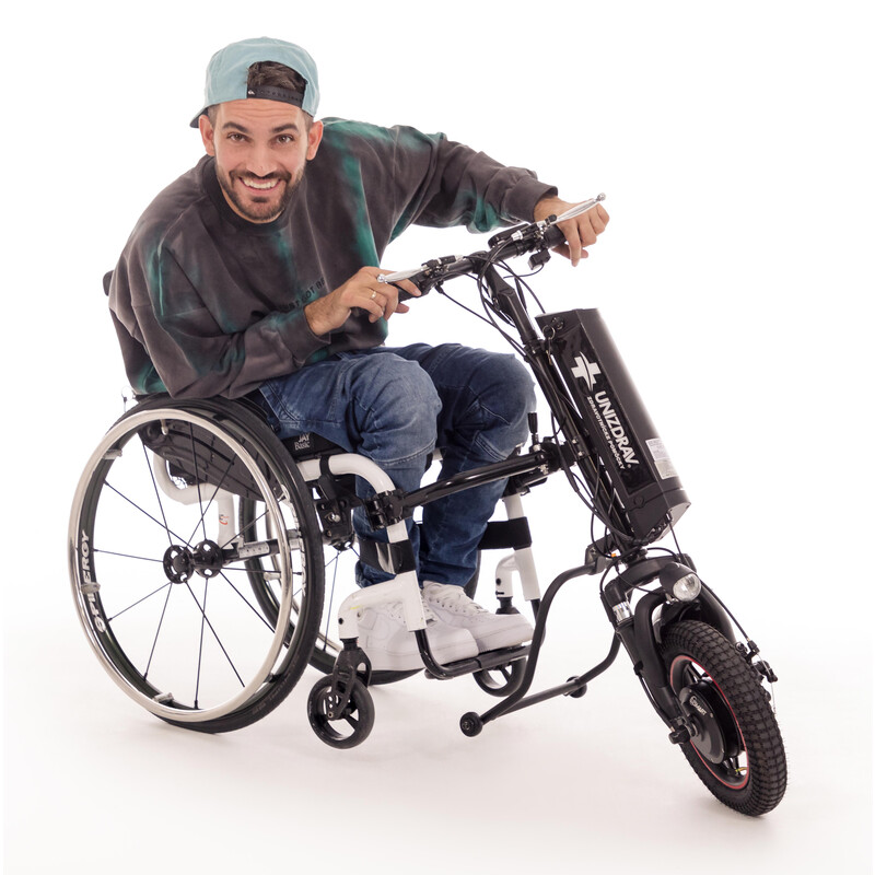 Prídavný pohon pre aktívny invalidný vozík