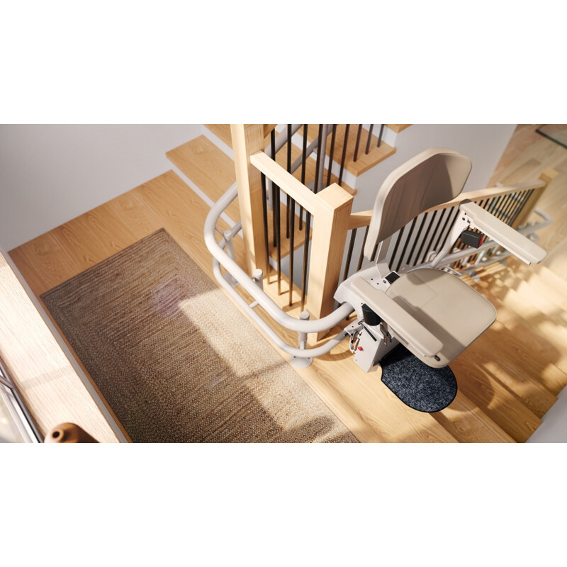 Stoličkový výťah Unizdrav so zatočenou koľajnicou